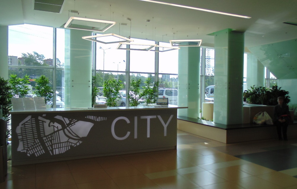 Многофункциональный торговый центр с парковкой автотранспорта - photo1